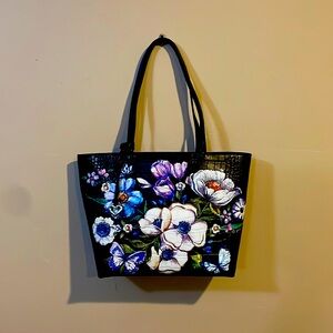 Brighton navy leather shoulder bag with painted floral design.